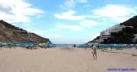 The sheltered Cala Llonga bay & beach. The Cala Llonga hotel on the right. The beach has both width & length