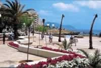 Cala Millor Promenade with boat Jetties in the background - Boat trips